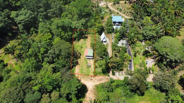 Fixer-Upper with Stream, Forest Views, and Investment Potential in Playa Hermosa selected