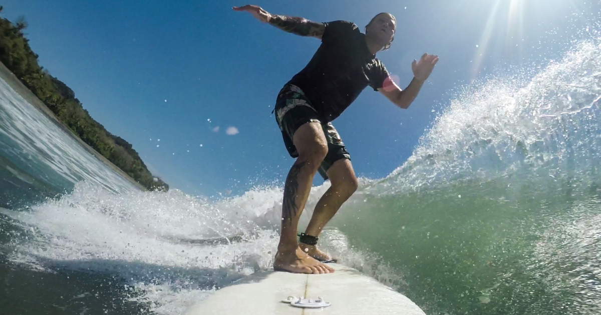 Surfer riding waves in Costa Rica