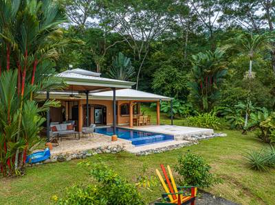 2-Bedroom Jungle Home with Window Ocean Views, Infinity Pool, and Strong Rental Potential in Matapalo image 2