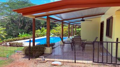 Move in ready 2 bedroom / 2 bathroom home with window ocean view and pool in Ojochal image 3