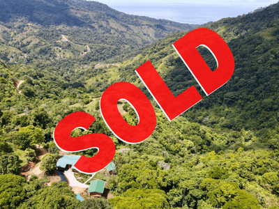 Eco-Luxury Home and Cabins with Waterfall, Ocean Views, and Organic Farming Potential image 1