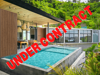 Sleek Modern Retreat with Ocean and Mountain Views in Ojochal image 1