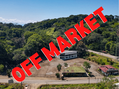 Prime 1.38-Acre Commercial Property for Sale at the Entrance to Ojochal, Costa Rica — River-Bordered, Sub-Dividable, Build-Ready image 1
