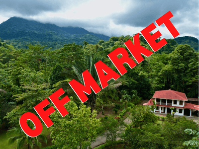 Tropical Paradise with Large Home, Orchard & River in Prime Location image 1