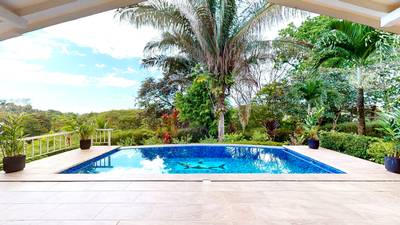 Charming 3 Bedroom Home with Lush Garden Acreage and Pocket Ocean View image 3