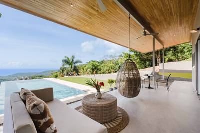 Elegant Mountain Retreat with Ocean and Jungle Views in a Private Gated Community image 1