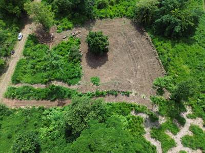 Serene 1.32-Acre Lot with Expansive Mountain Views in Caracara Ridge, Ojochal image 1