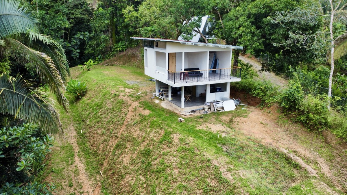 Fixer-Upper with Stream, Forest Views, and Investment Potential in Playa Hermosa selected
