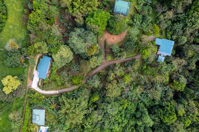Two Modern Homes with Mountain View, Creek Access, and Multiple Building Sites in Tumbas, Tinamastes image 2
