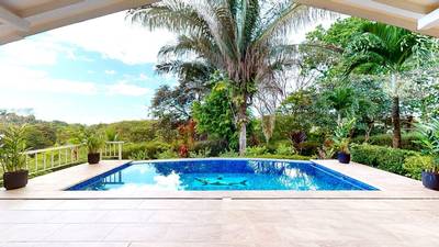 Charming 3 Bedroom Home with Lush Garden Acreage and Pocket Ocean View image 3