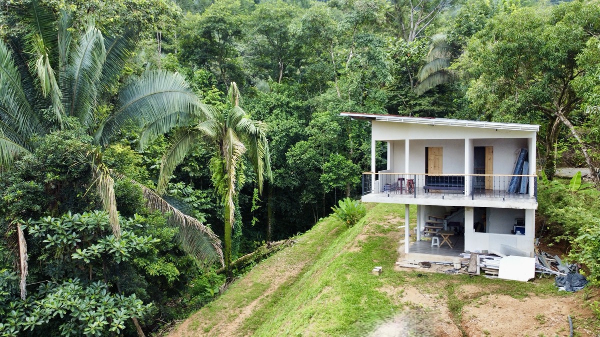 Fixer-Upper with Stream, Forest Views, and Investment Potential in Playa Hermosa selected