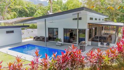 Jungle-Immersed Modern Retreat with Riverfront, Pool, and Expansion Potential in Cinco Ventanas image 1