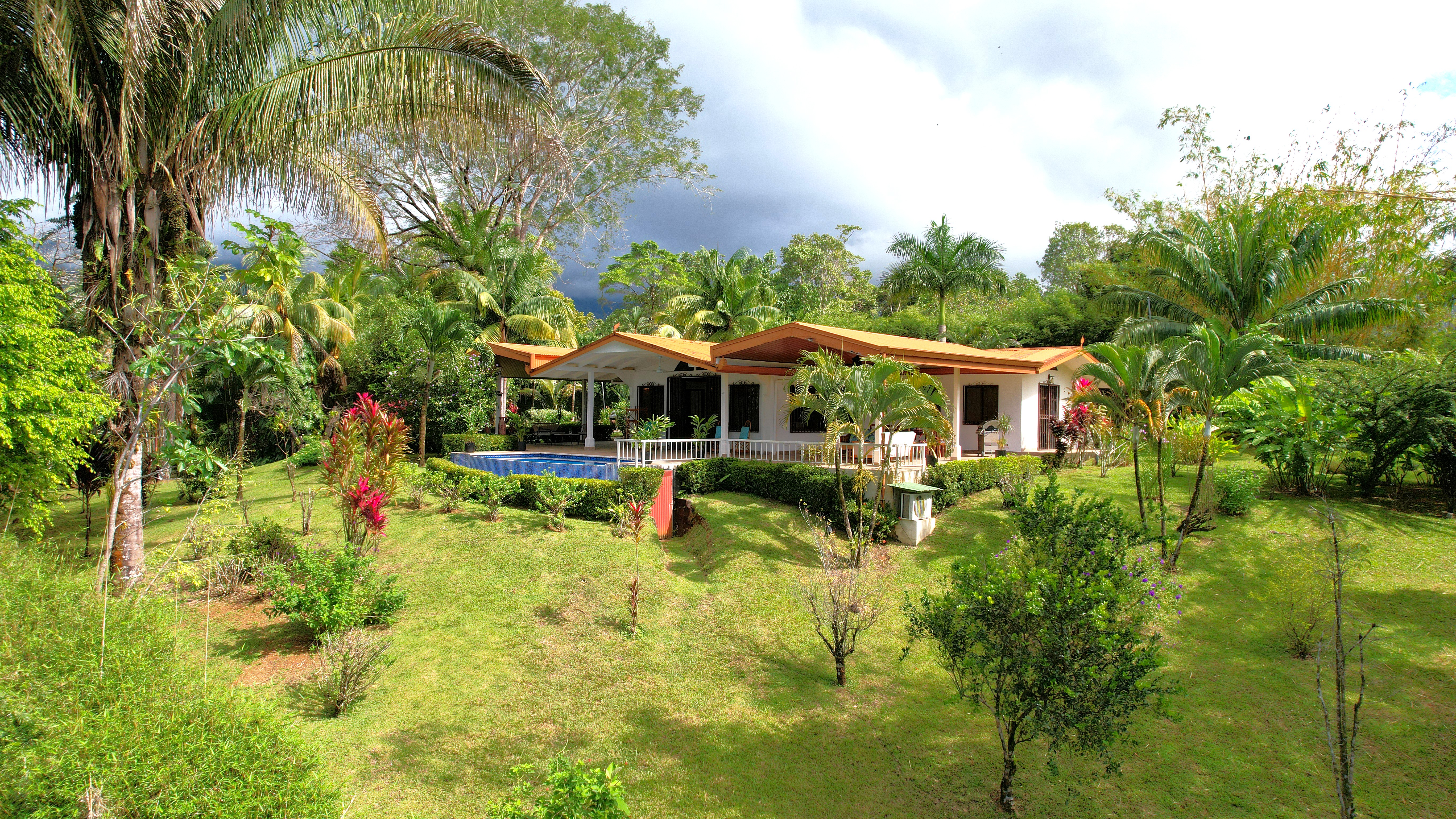 Charming 3 Bedroom Home with Lush Garden Acreage and Pocket Ocean View selected