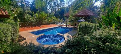 Income Producing Jungle Retreat with 8 Cabinas and Pool in the Heart of Uvita image 1