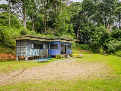 2.2-Acre Property in Cinco Ventanas with Container Home, Legal Well, Multiple Terraces & Exceptional Development Potential image 1
