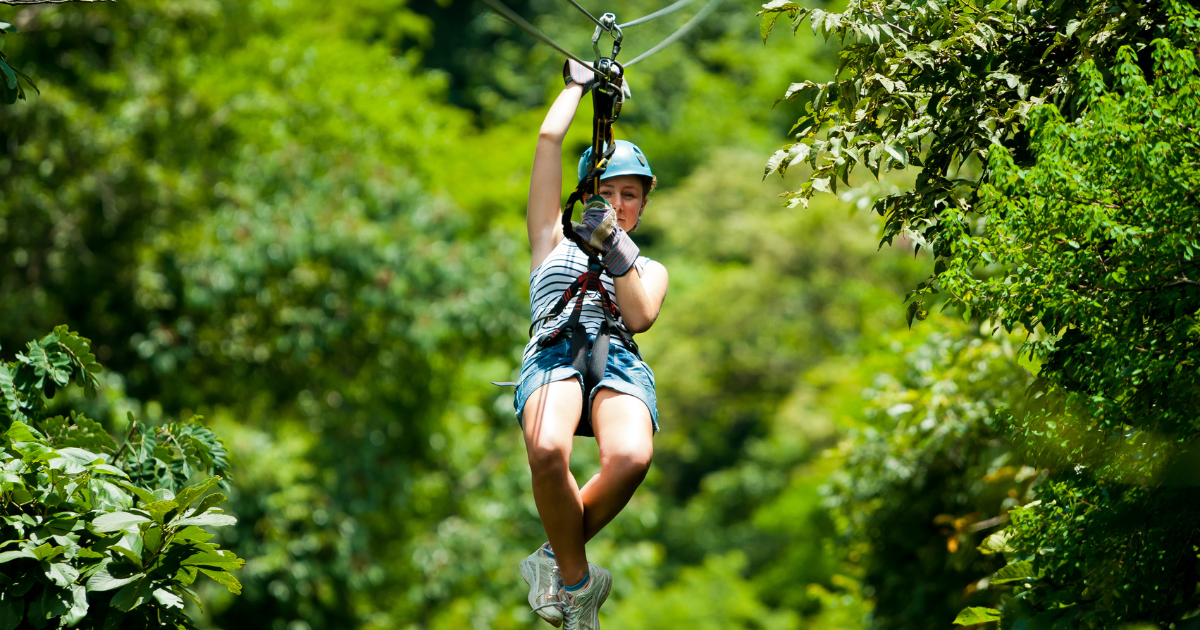 Ziplining through jungle canopy