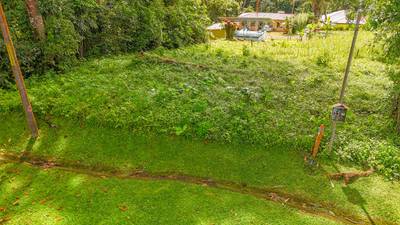 Private Jungle-Border Lot in Ojochal – Ready to Build, Gated Community, River Access image 1
