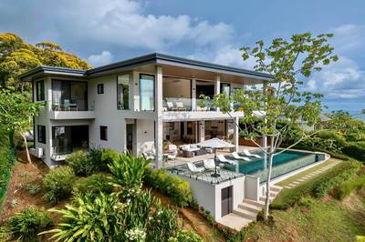 Luxurious 5-Bedroom Estate with Infinity Pool and Sweeping Coastal Views image 2