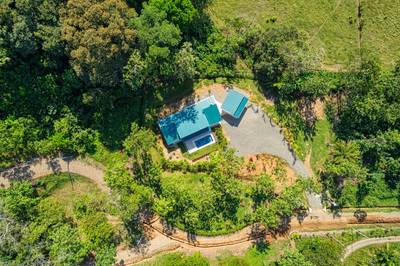 Casa del Bosque — A Modern Jungle Retreat in the New Tulpá Ridge Community, Matapalo image 3