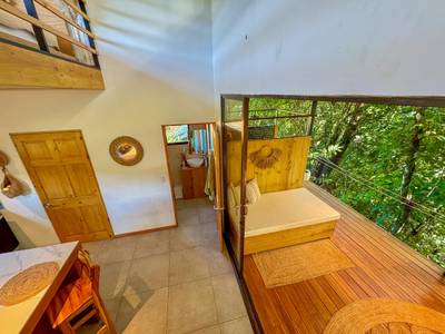 1-Bedroom Jungle River Retreat with Room to Build Your Dream Home in the Heart of Ojochal image 3