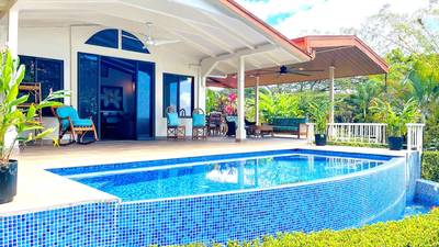 Charming 3 Bedroom Home with Lush Garden Acreage and Pocket Ocean View image 2