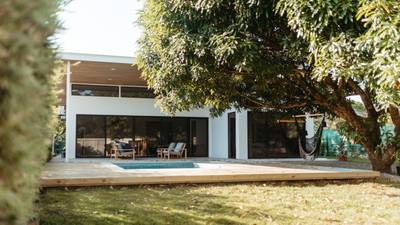 Casa Mango | Elevated Boho Home near the Beach image 1