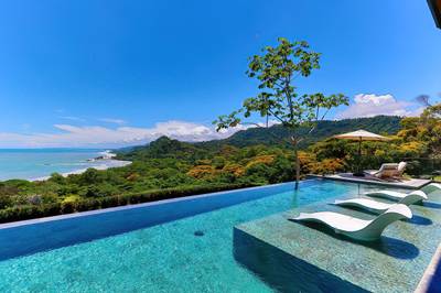 Luxurious 5-Bedroom Estate with Infinity Pool and Sweeping Coastal Views image 3