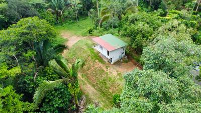 Fixer-Upper with Stream, Forest Views, and Investment Potential in Playa Hermosa image 1