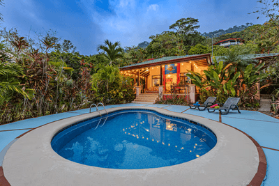 Dual-Income Opportunity Surrounded by Jungle Paradise in Escaleras image 1