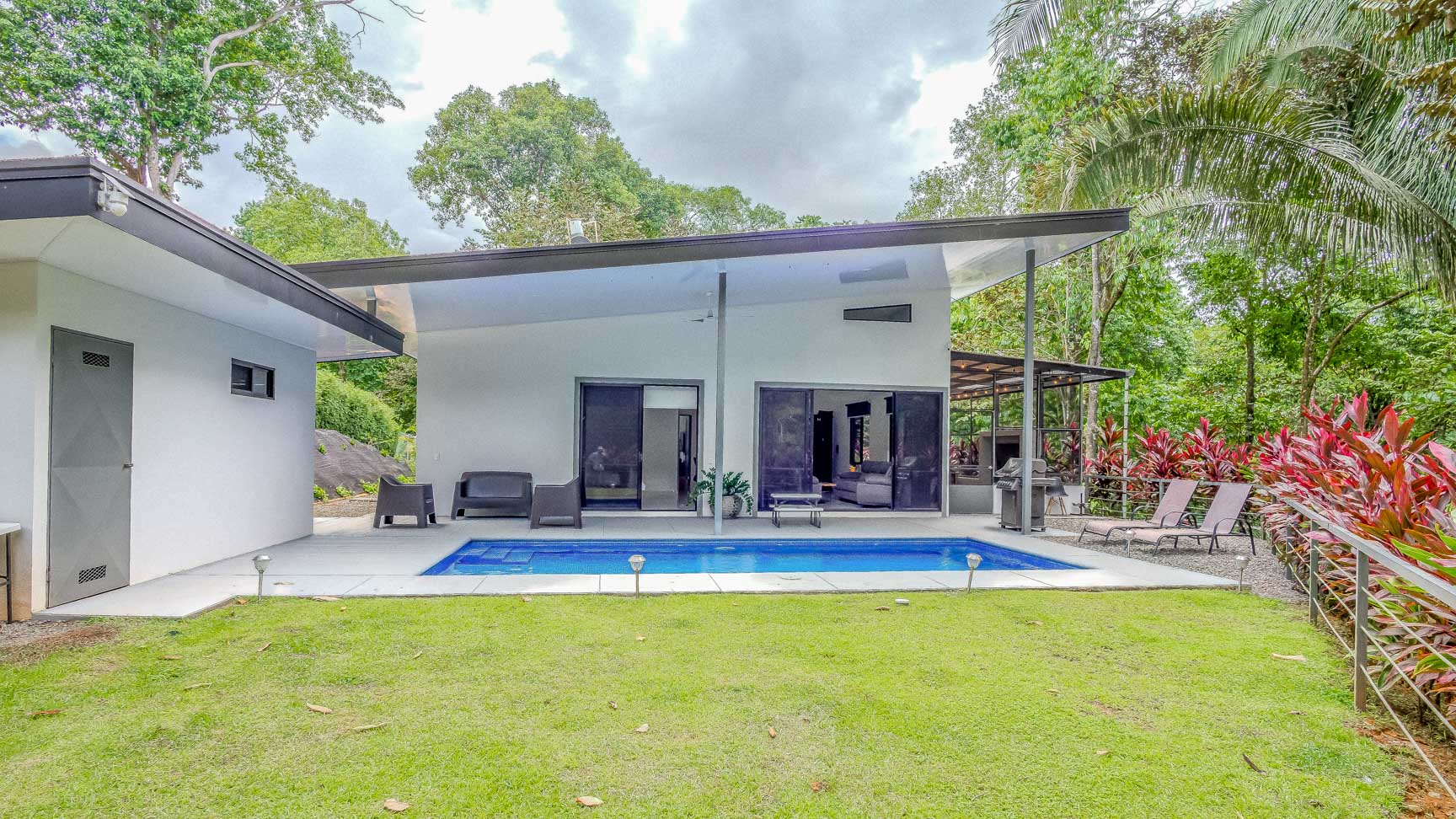 Jungle-Immersed Modern Retreat with Riverfront, Pool, and Expansion Potential in Cinco Ventanas selected