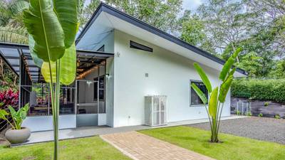 Jungle-Immersed Modern Retreat with Riverfront, Pool, and Expansion Potential in Cinco Ventanas image 4