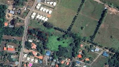 Easy-Access Building lot with Paved Road Access & All Utilities Available on a Flat Half-Acre in Ojochal Costa Rica image 1